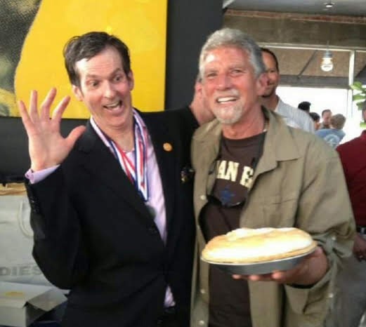 Steve Bornstein and Chris Walker with the pie